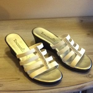 Italian made sandals with rhinestone details.